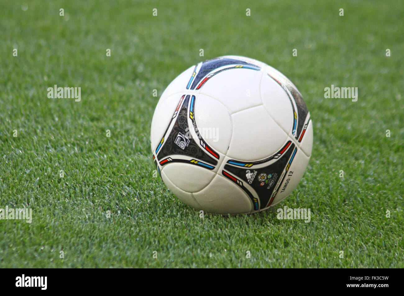 KYIV, UKRAINE - MAY 10, 2012: Close-up official UEFA European 2012 Championship (EURO 2012) ball on the grass during the game be Stock Photo