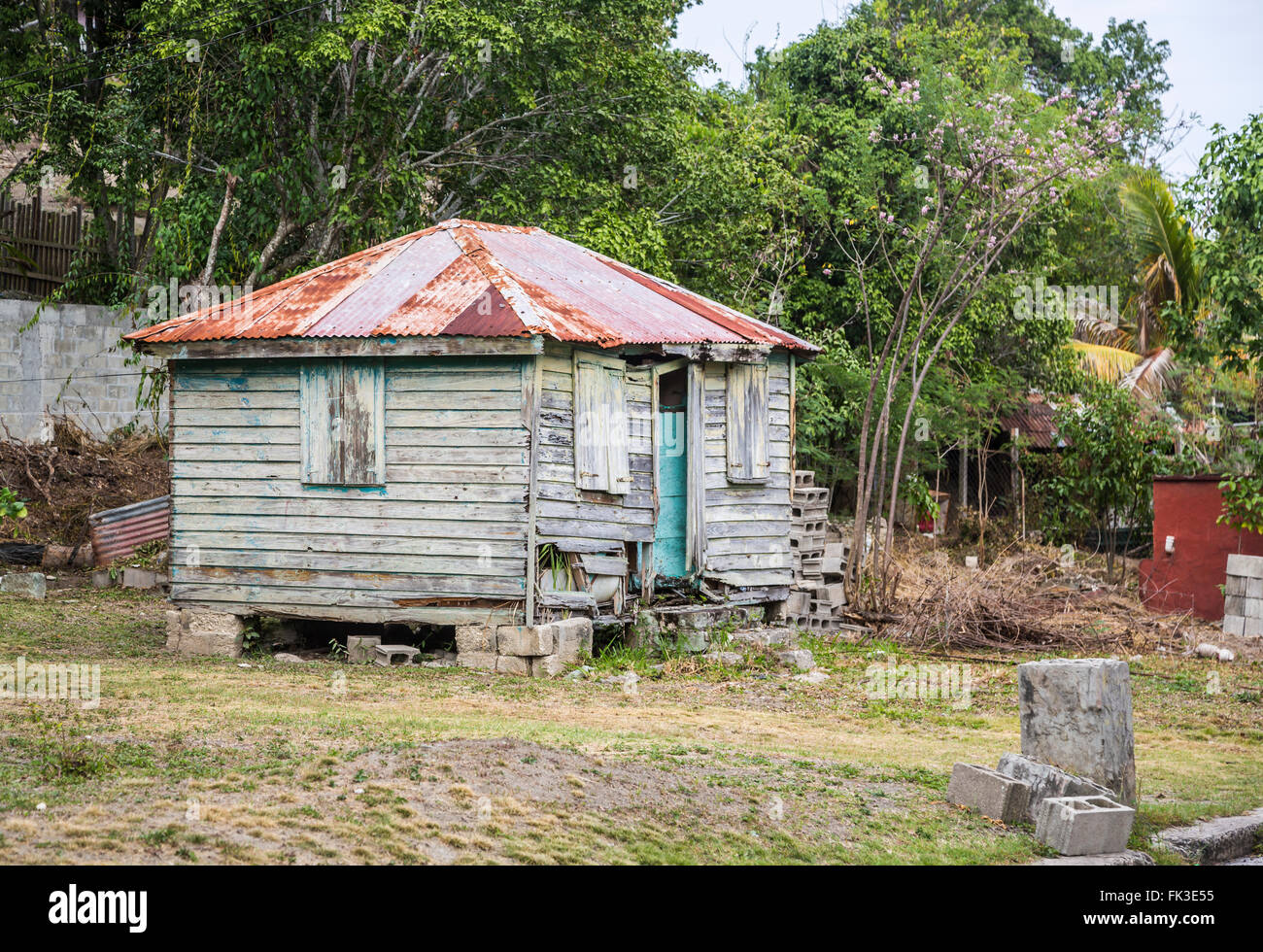 Typical run-down, boarded up, dilapidated wooden house in Liberta, south Antigua, Antigua and Barbuda, West Indies Stock Photo