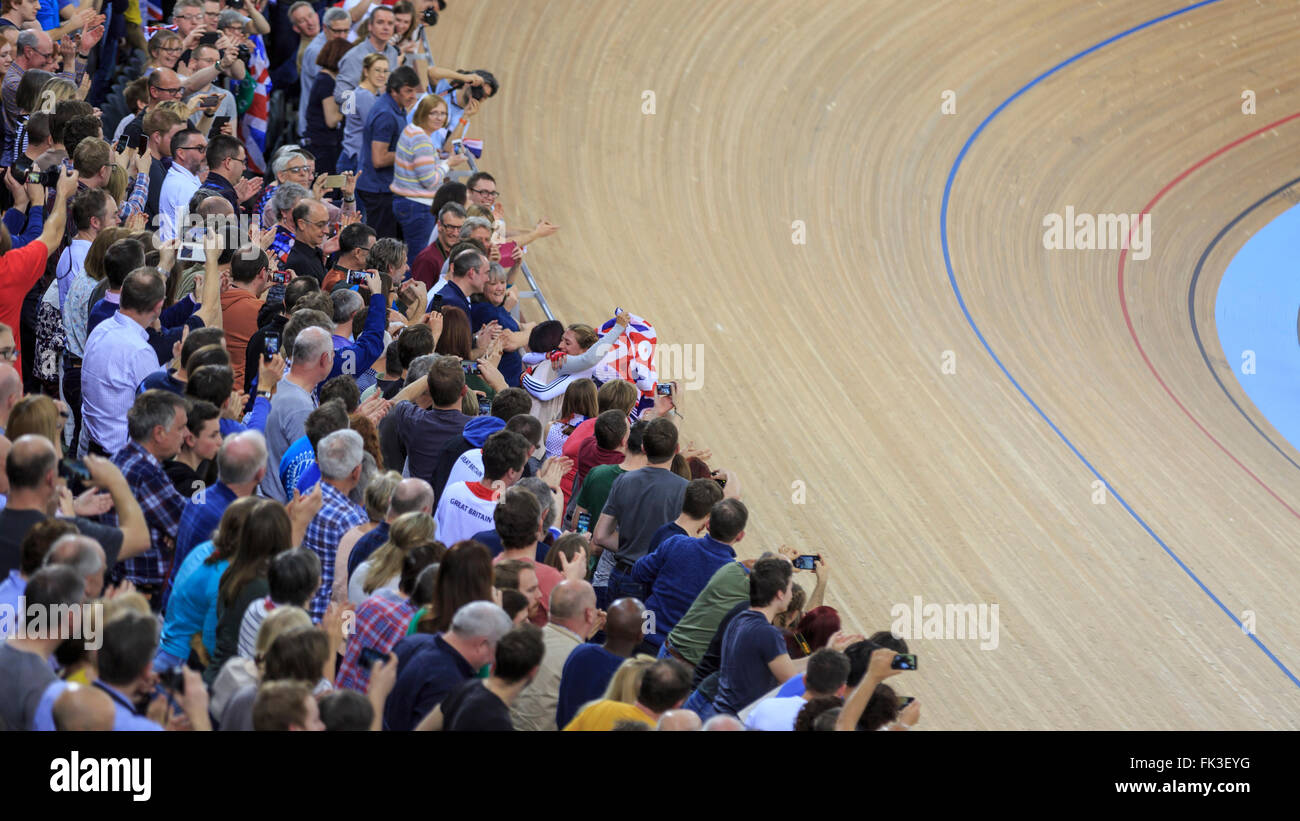 London, UK, 6 March 2016. UCI 2016 Track Cycling World Championships. Great Britain's Laura Kenny (Laura Trott) celebrates after winning the Women's Omnium. She finds and hugs her mother, Glenda Trott, in the crowd. Credit:  Clive Jones/Alamy Live News Stock Photo