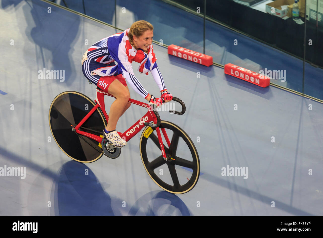 London, UK, 6 March 2016. UCI 2016 Track Cycling World Championships. Great Britain's Laura Kenny (Laura Trott), with a Union Flag draped around her, celebrates after winning the Women's Omnium. Credit:  Clive Jones/Alamy Live News Stock Photo