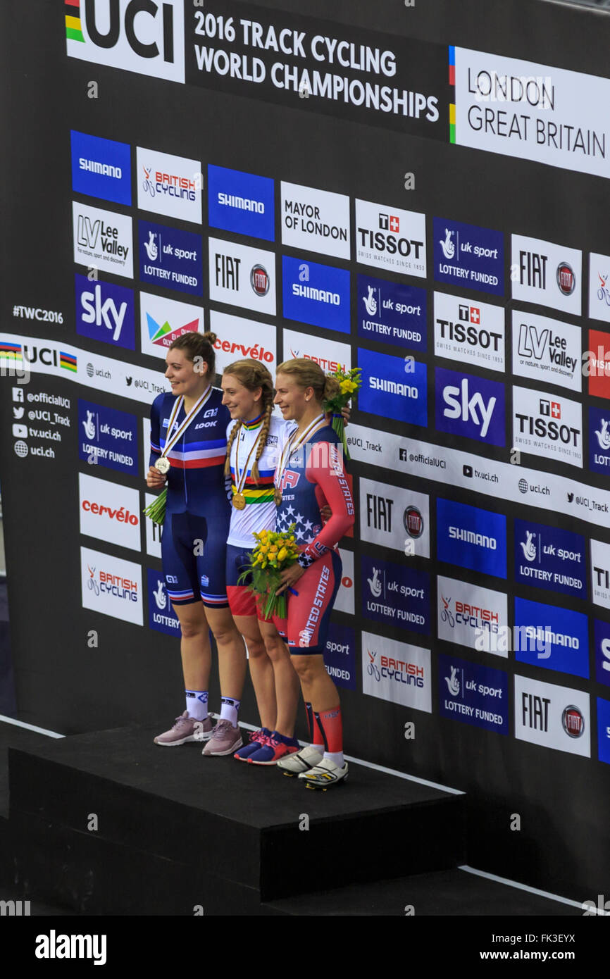 London, UK, 6 March 2016. UCI 2016 Track Cycling World Championships. The podium for the Women's Omnium featured Laura Kenny (Laura Trott) (Great Britain, centre, Gold), Laurie Berthon (France, left, Silver) and Sarah Hammer (USA, right, Bronze). Credit:  Clive Jones/Alamy Live News Stock Photo