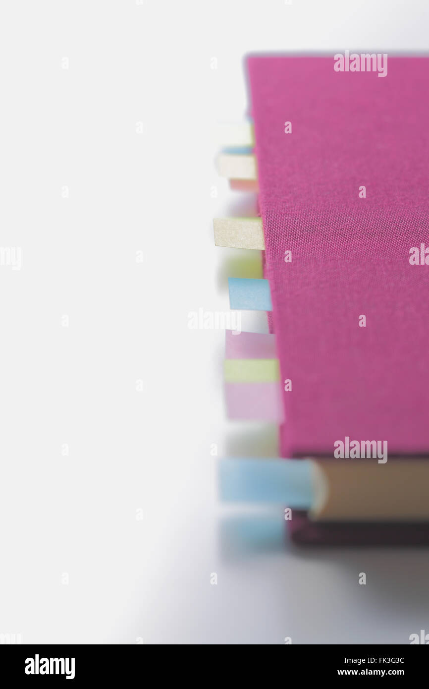 Notebook With Post Notes Post-it notes on a notebook Stock Photo - Alamy