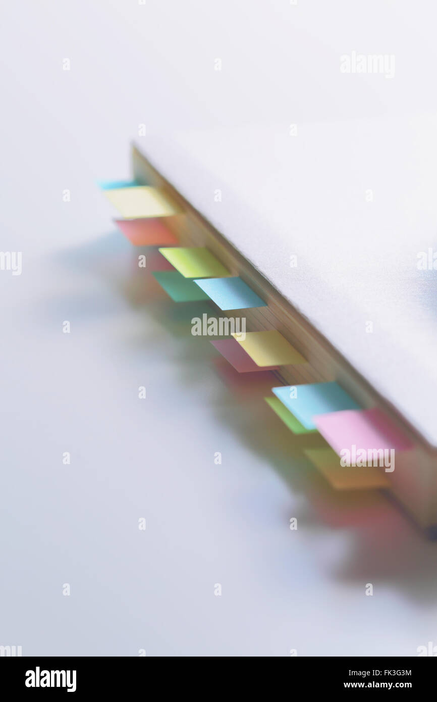 Notebook With Post Notes Post-it notes on a notebook Stock Photo - Alamy