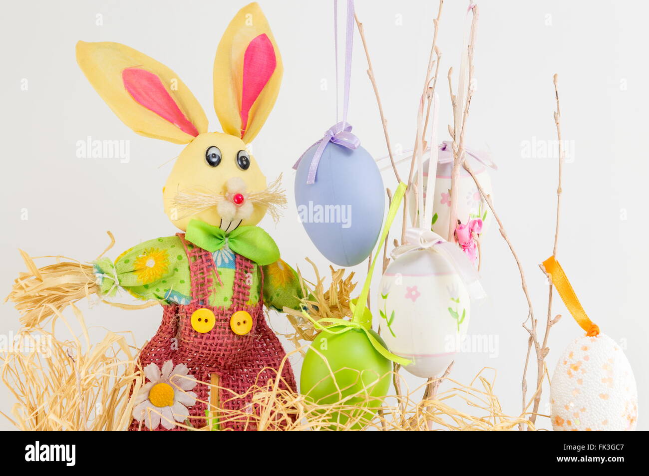Easter bunny toy and decorated Easter eggs Stock Photo