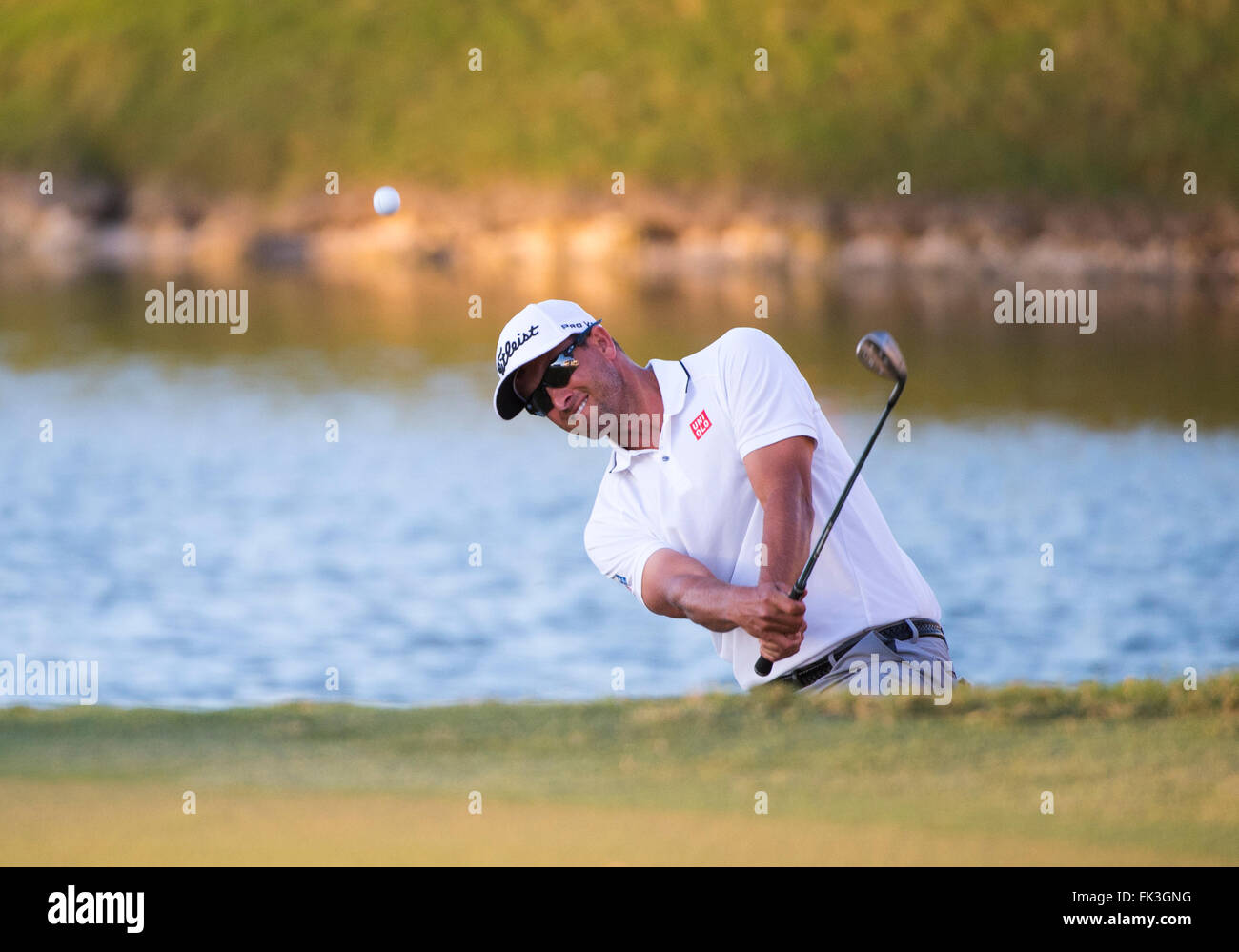 Doral, Florida, USA. 06th Mar, 2016. Adam Scott of Australia chips at the 18th hole during the final round of the World Golf Championships-Cadillac Championship on the TPC Blue Monster course at the Trump Doral Golf Club and Resort in Doral, FL. Credit:  Action Plus Sports/Alamy Live News Stock Photo