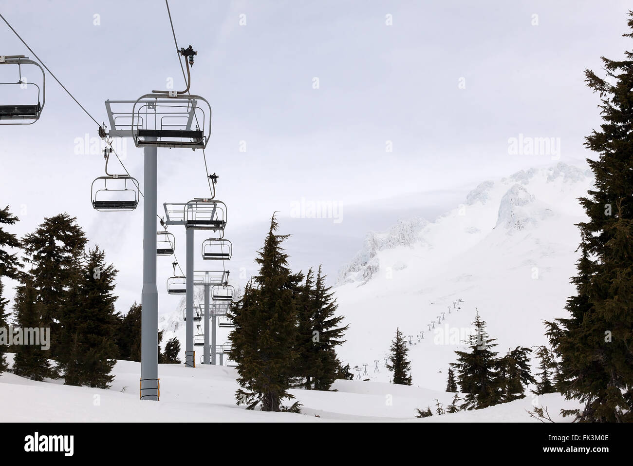 Ski Lifts up to the slope of Mount Hood Oregon during Winter Season Stock Photo