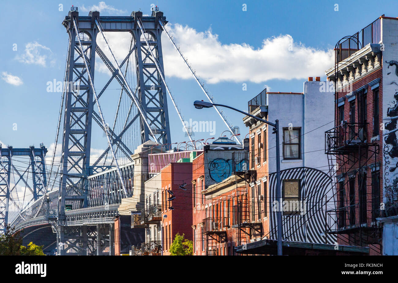 Brooklyn street scene with block of buildings near the Williamsburg Bridge in New York City Stock Photo