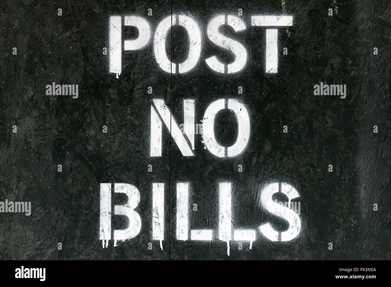 Post no bills spray painted sign in New York City Stock Photo