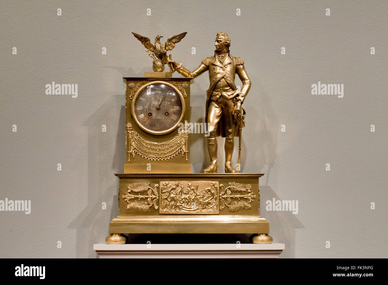 Gilded brass antique mantel clock, circa 1815 - USA Stock Photo