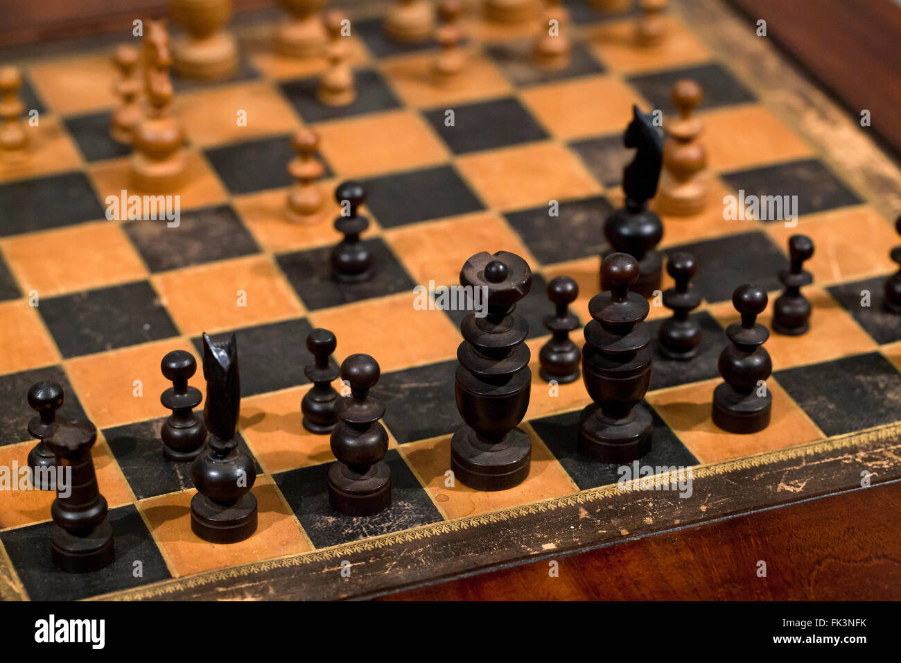 Vintage handcrafted wooden chess board and pieces - USA Stock Photo