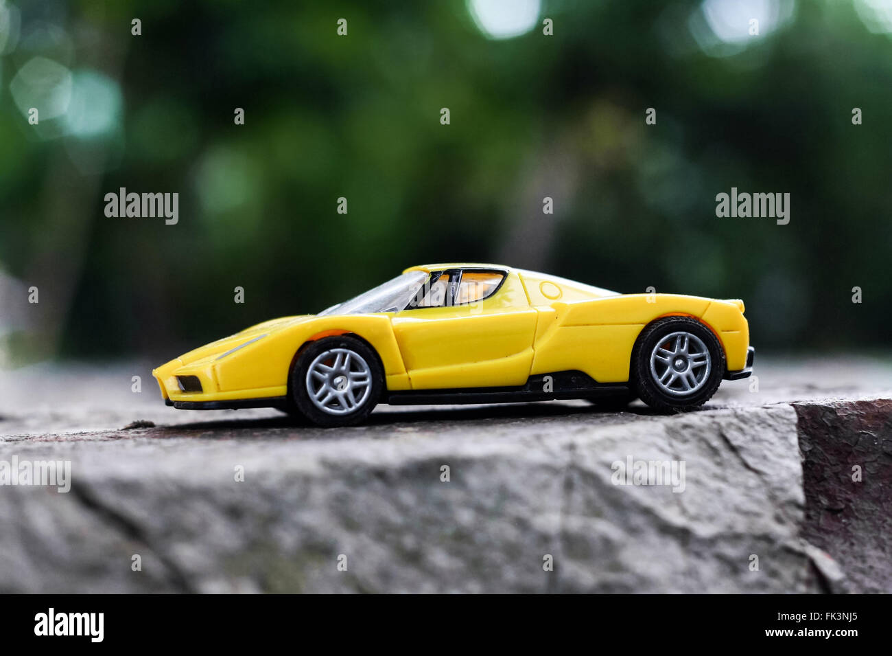 Yellow toy car Stock Photo