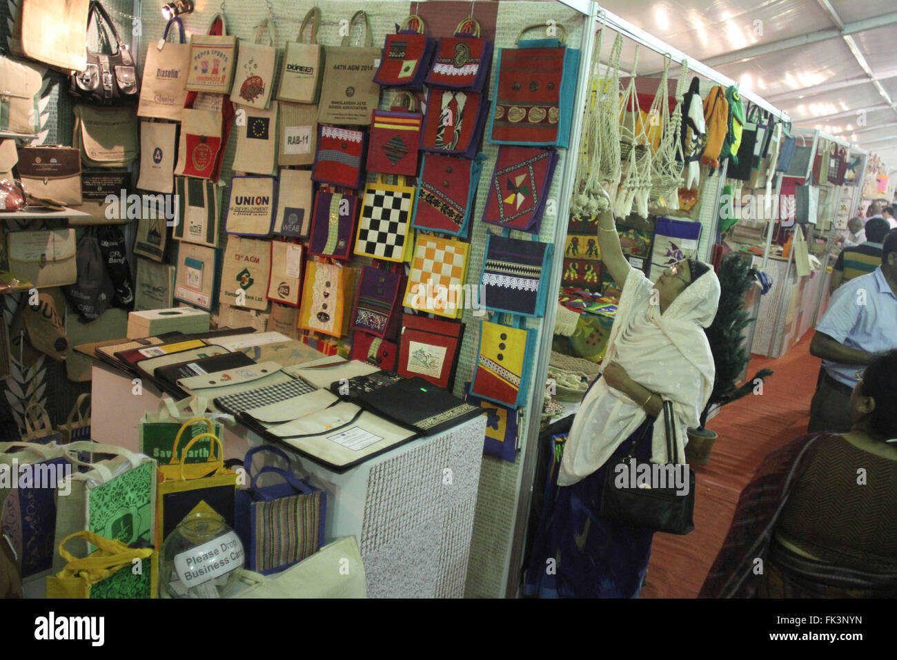 Dhaka, Bangladesh. 6th Mar, 2016. Visitors look at jute products at a stall during a three-day fair at Bangabandhu International Conference Center in Dhaka, Bangladesh, March 6, 2016. A three-day fair on diversification of jute products began in Dhaka on Sunday to promote jute and jute products in the world market. © Shariful Islam/Xinhua/Alamy Live News Stock Photo