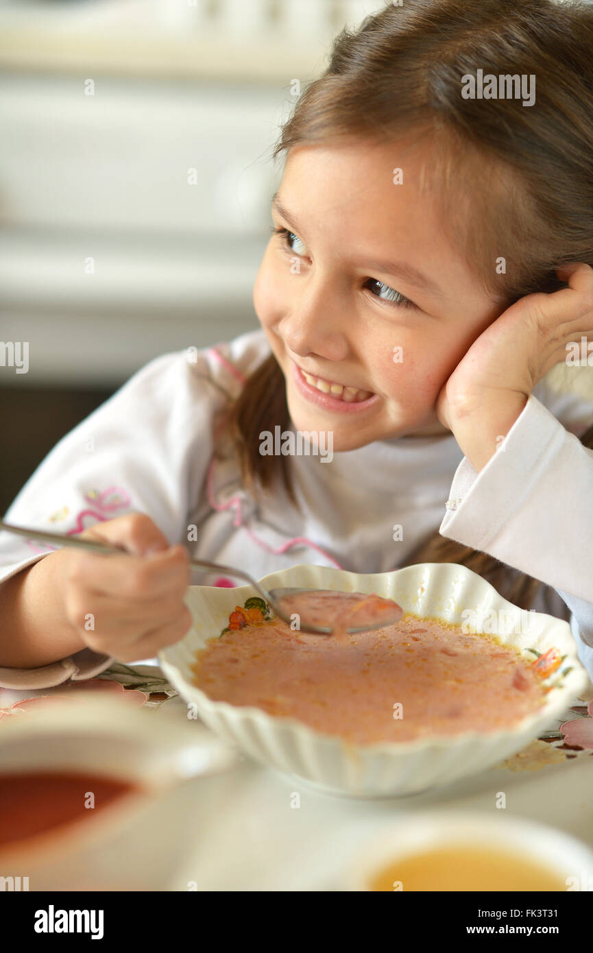 girl eating soup Stock Photo Alamy
