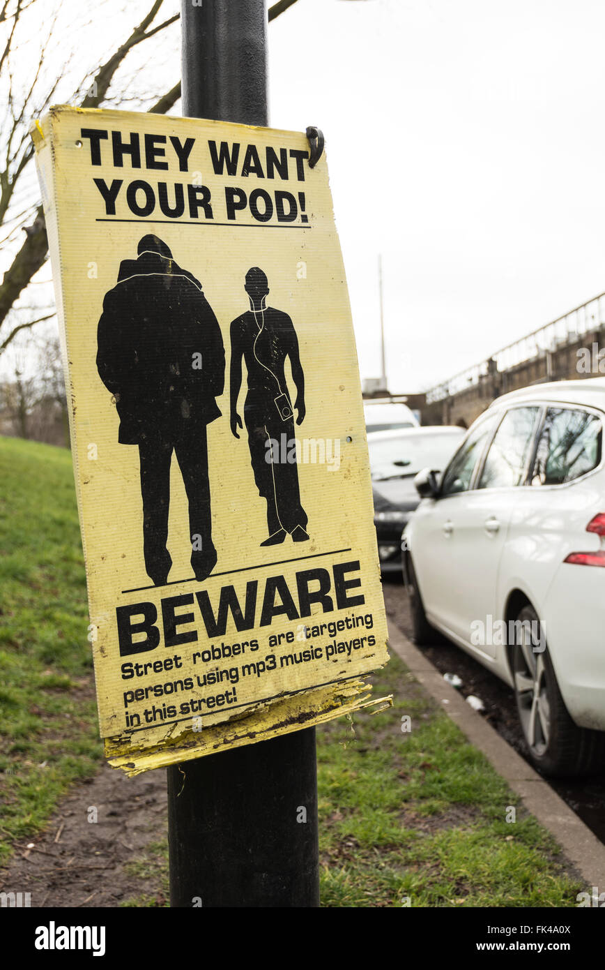 Beware - They Want Your Pod car theft warning sign in London street, UK. Stock Photo