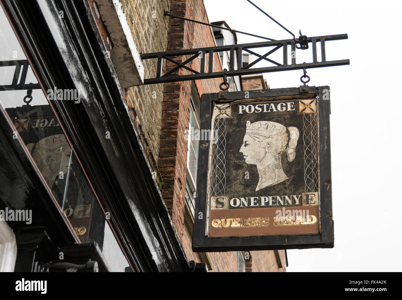 Penny Black pub sign outside the Queen's Head pub in London, UK Stock Photo