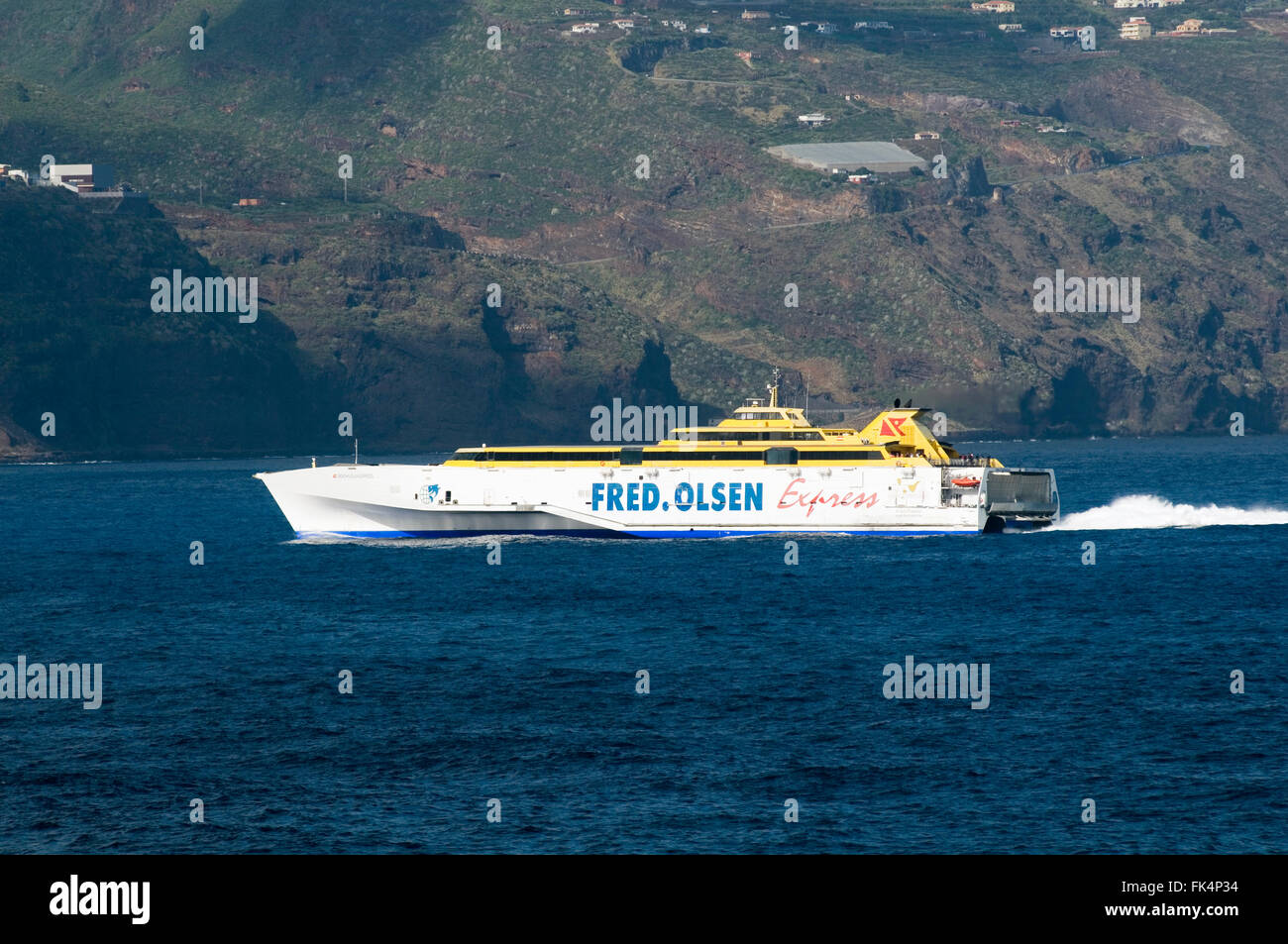 Benchijigua Express hydrofoil fast ferry operated by Fred Olsen line in the canary islands approaching   Santa Cruz de La Palma Stock Photo