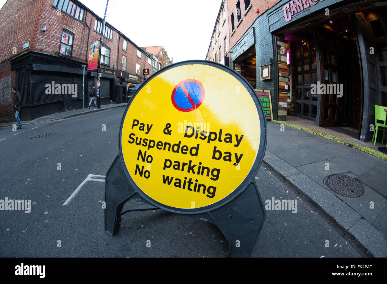 Pay & display suspended bay road sign in Thomas Street, Manchester. Stock Photo