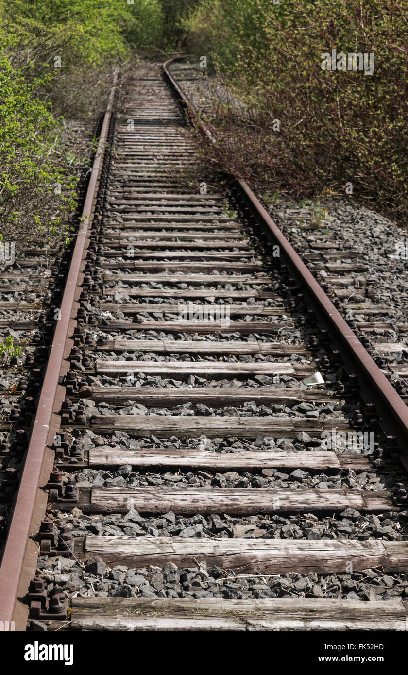 deserted stretch of railroad track Stock Photo
