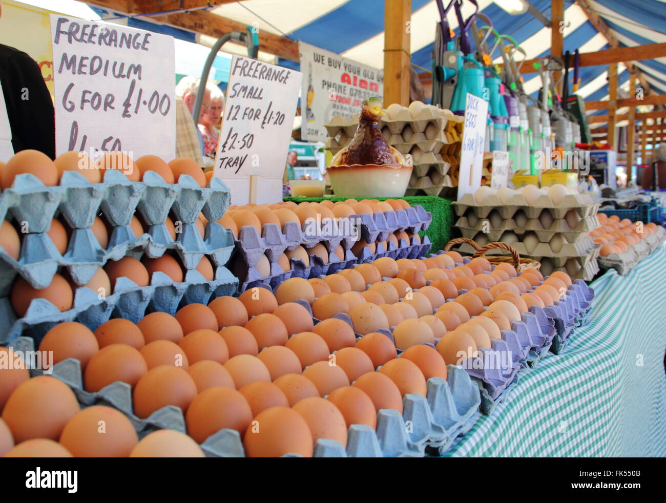 Trays of free range hen eggs for sale on a market stall in Derbyshire