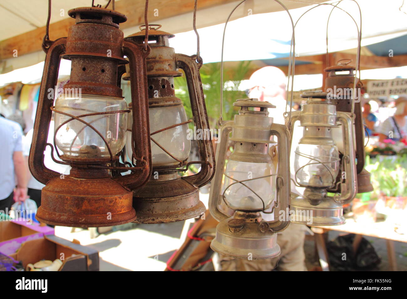 Vintage style traditional lamps for sale on an outdoor market stall at the flea market in Chesterfield town centre, England UK Stock Photo