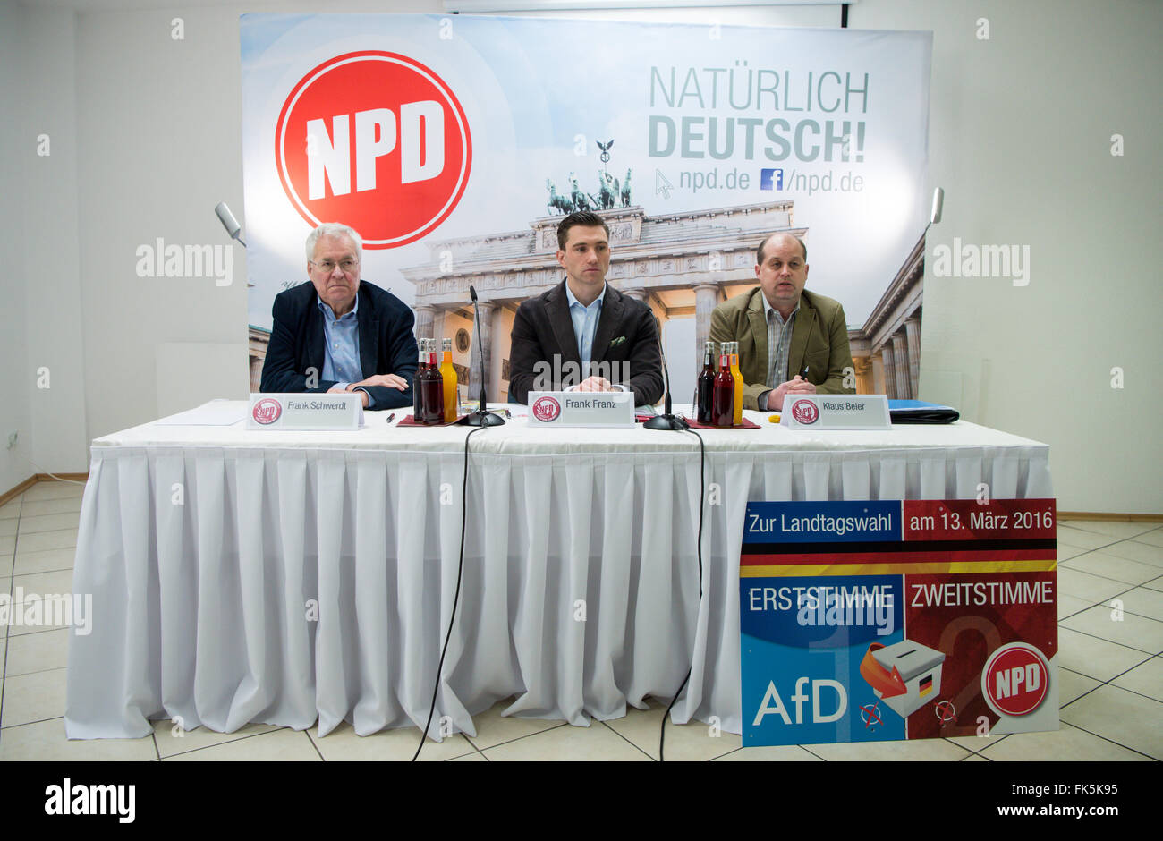 Berlin, Germany. 07th Mar, 2016. Frank Schwerdt (L-R), deputy federal chairman of the right-wing extremist National Democratc Party (NPD), Frank Franz, federal chairman, and Klaus Beier, federal whip, speak at a press conference on the proceedings in the NPD ban and the upcoming parliamentary elections in NPD party headquarters in Berlin, Germany, 07 March 2016. Photo: BERND VON JUTRCZENKA/dpa/Alamy Live News Stock Photo
