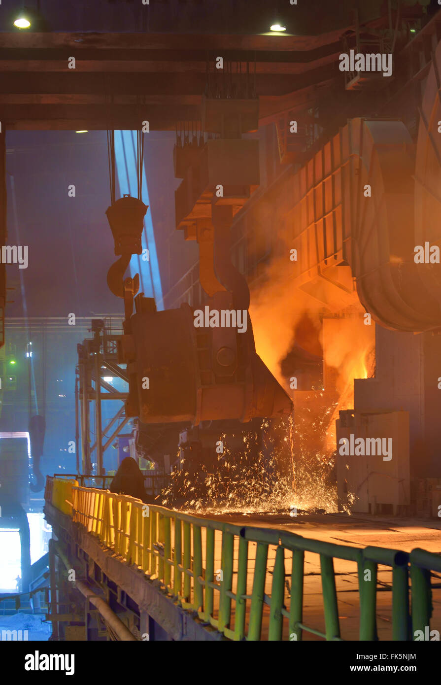 Hot steel pouring in steel plant Stock Photo