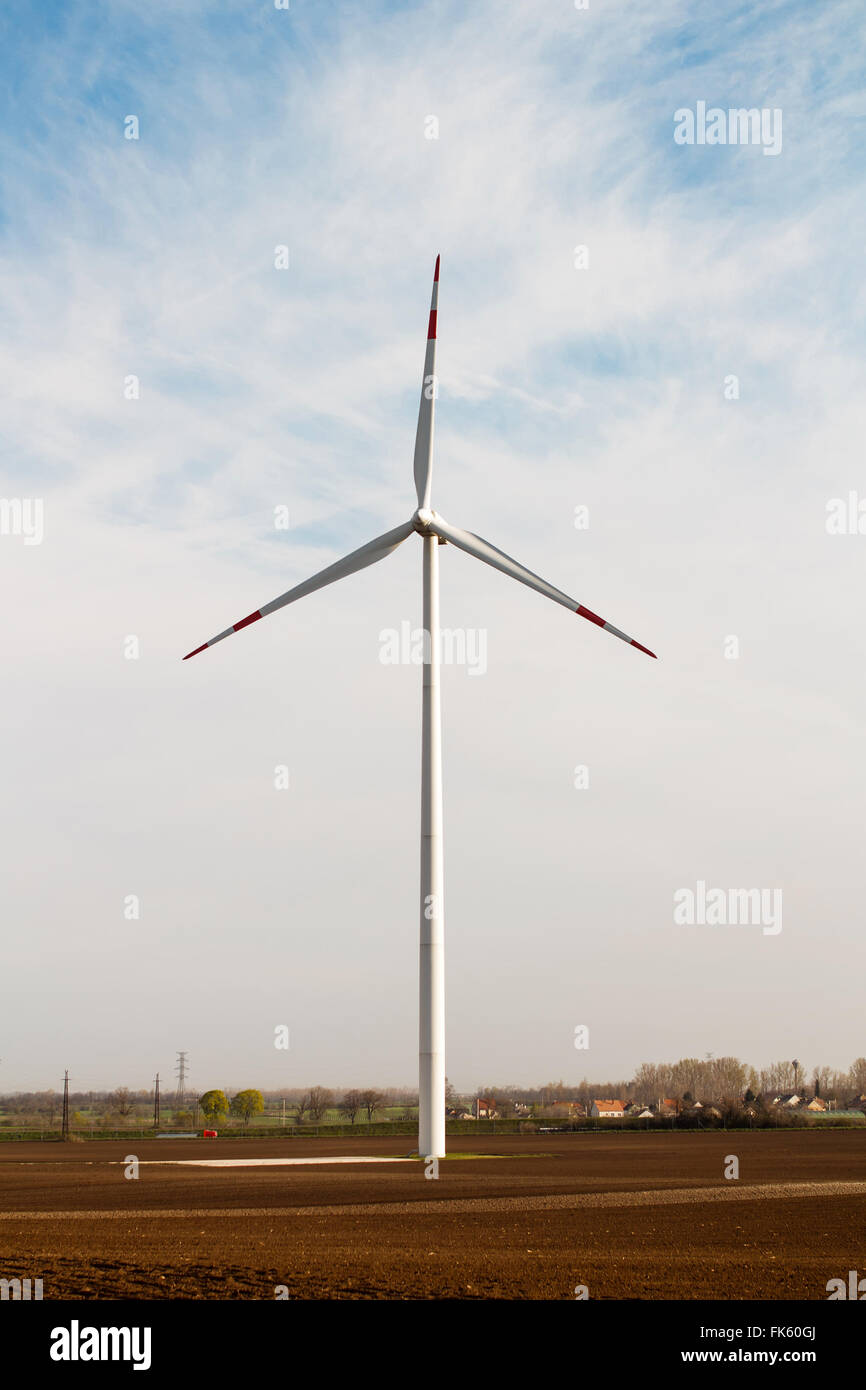 Wind power plant on field Stock Photo