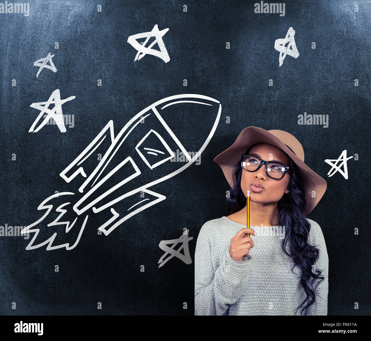 Woman thinking holding pencil hi-res stock photography and images - Alamy