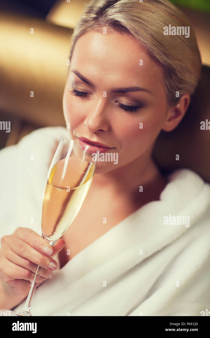 beautiful young woman drinking champagne at spa Stock Photo Alamy