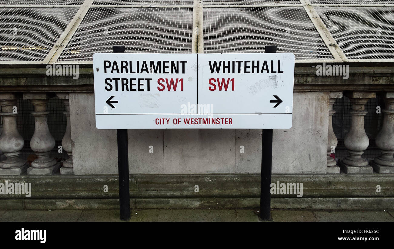 Road signs for Parliament street and Whitehall in London UK Stock Photo