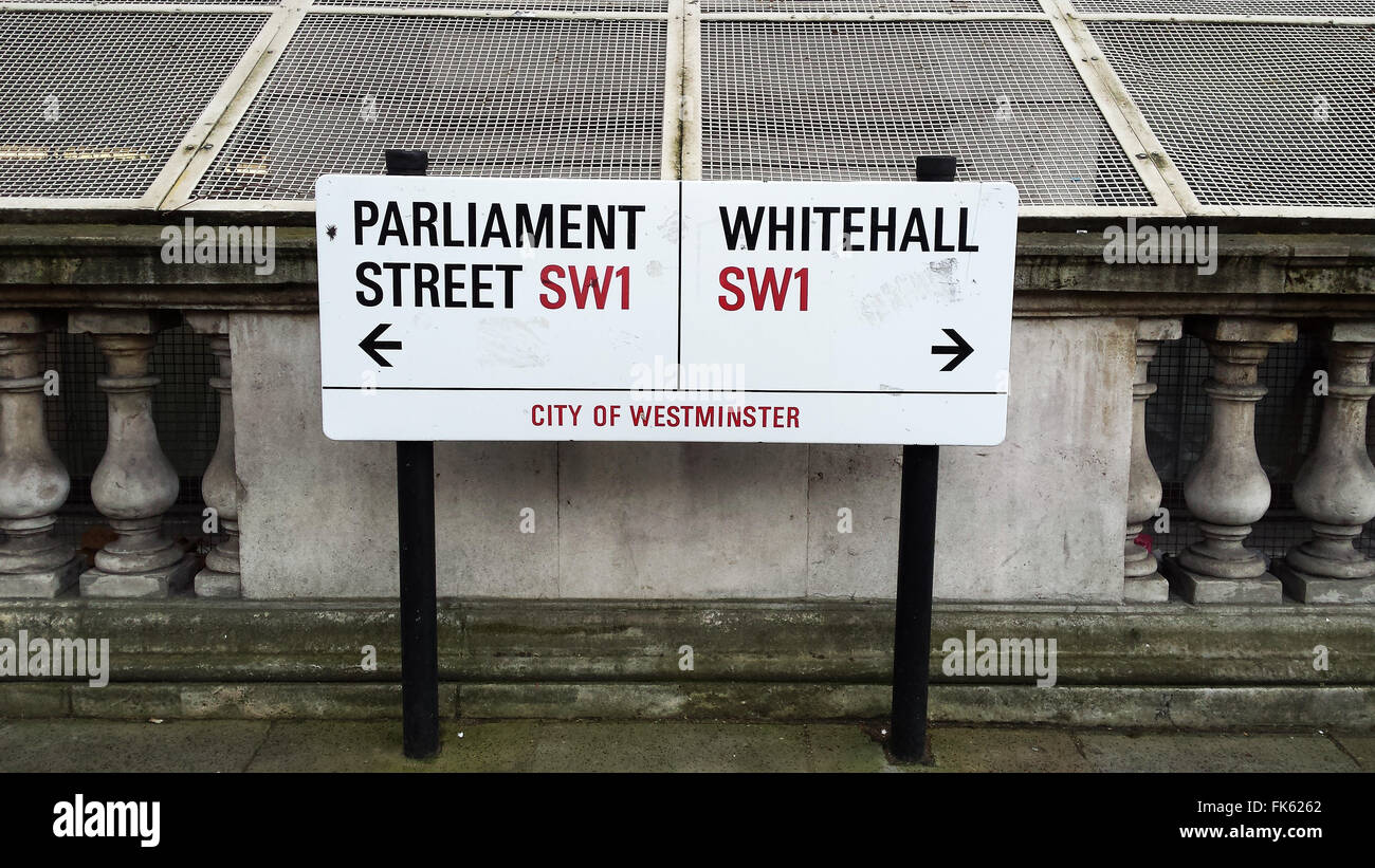 Road signs for Parliament street and Whitehall in London UK Stock Photo