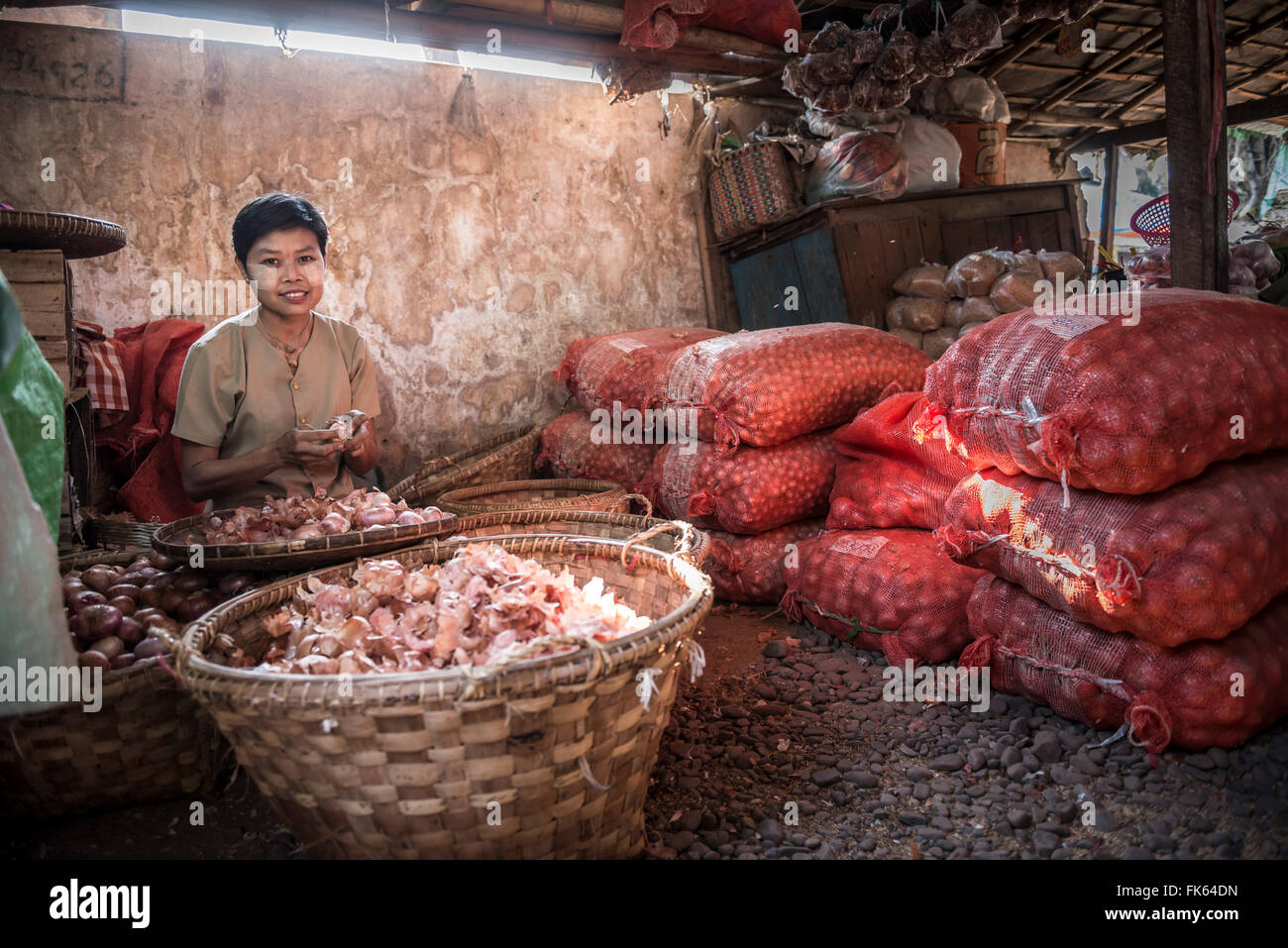 Hsipaw market, portrait of a woman peeling onions, Shan State, Myanmar (Burma), Asia Stock Photo