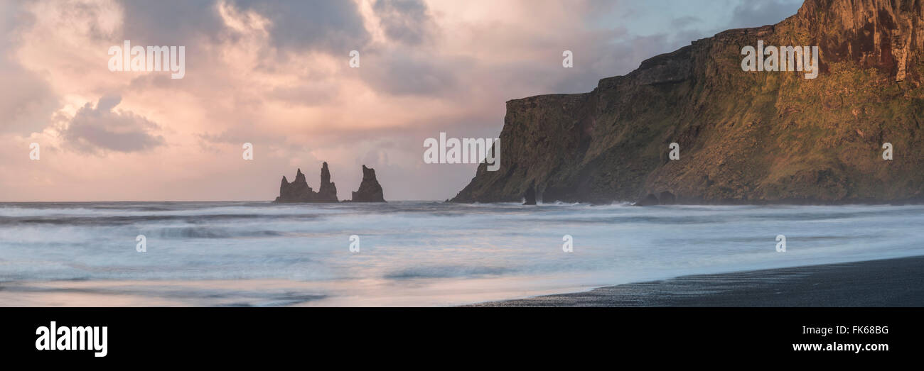 Reynisdrangar Basalt Sea Stacks at sunrise, Vik, South Region (Sudurland), Iceland, Polar Regions Stock Photo