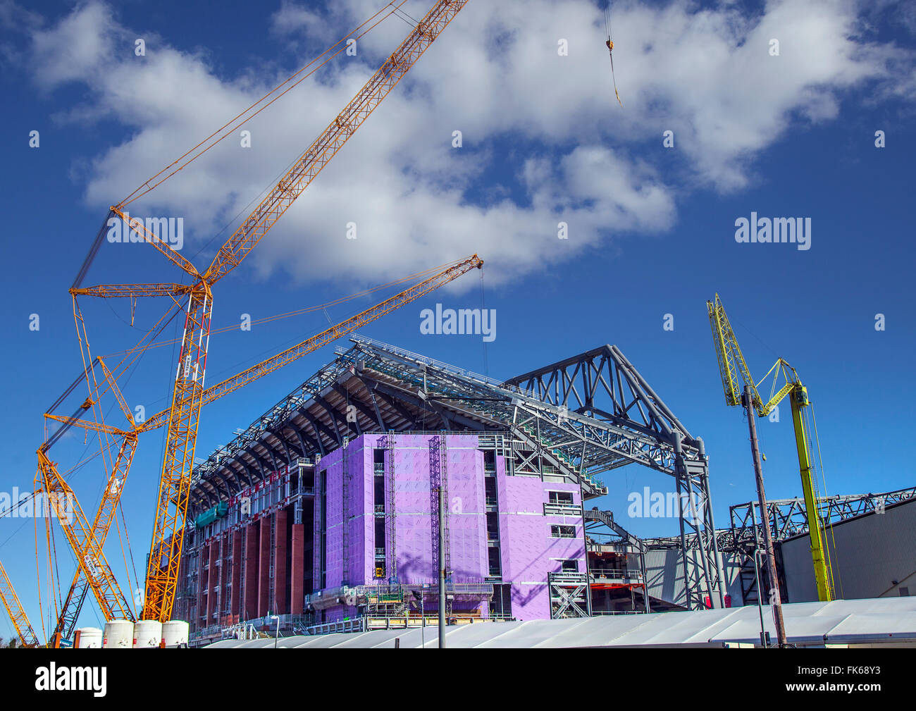 Steel erector working on New Stadium under construction Liverpool Stock