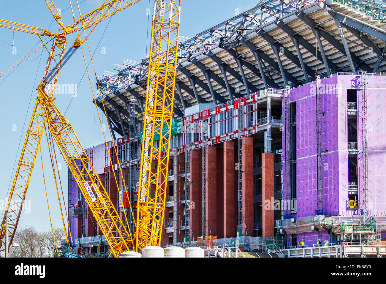 Liverpool FC New Stadium expansion under construction; Football Club Stadia  site improvements underway with up to 2000 building workers jobs available  with the new Anfield Development of their iconic sports stadium, part