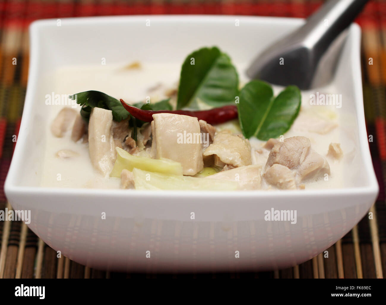 Thai cuisine- tom kha kai -chicken in coconut milk soup Stock Photo