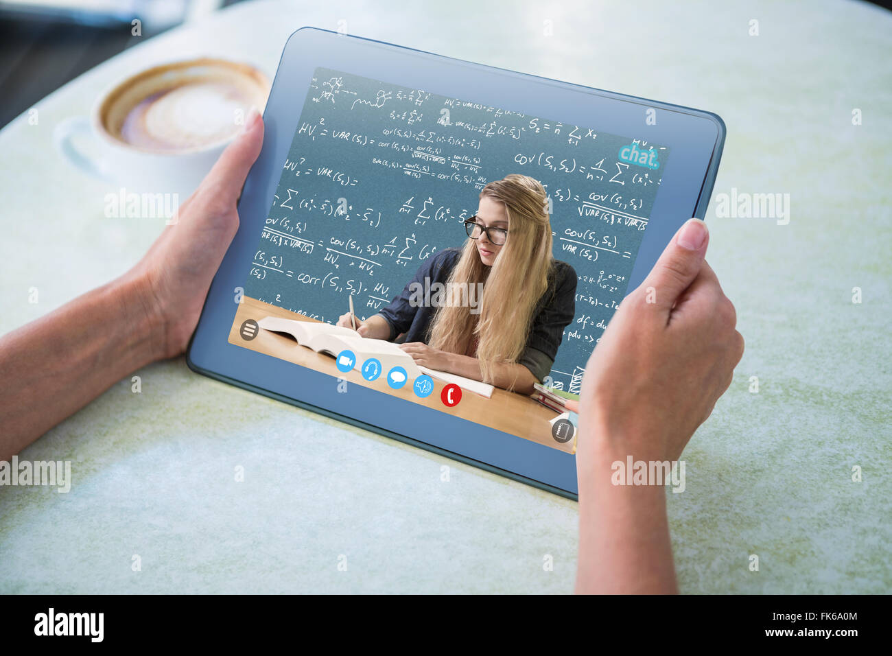 Composite image of student studying in the library Stock Photo