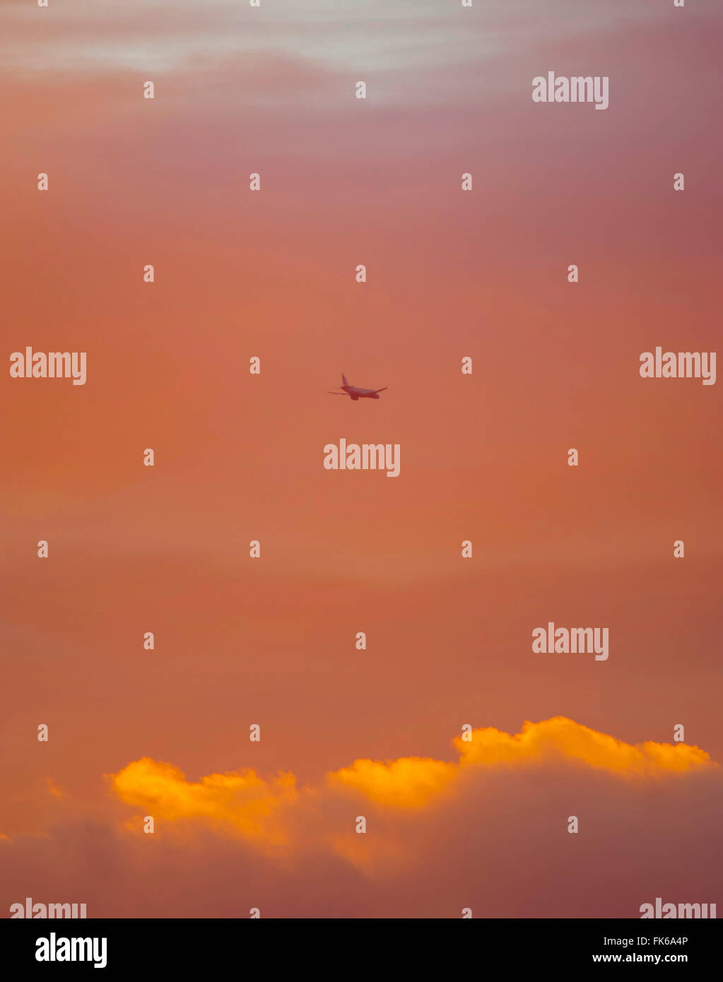 Plane leaving Heathrow at sunset, London, England, United Kingdom, Europe Stock Photo