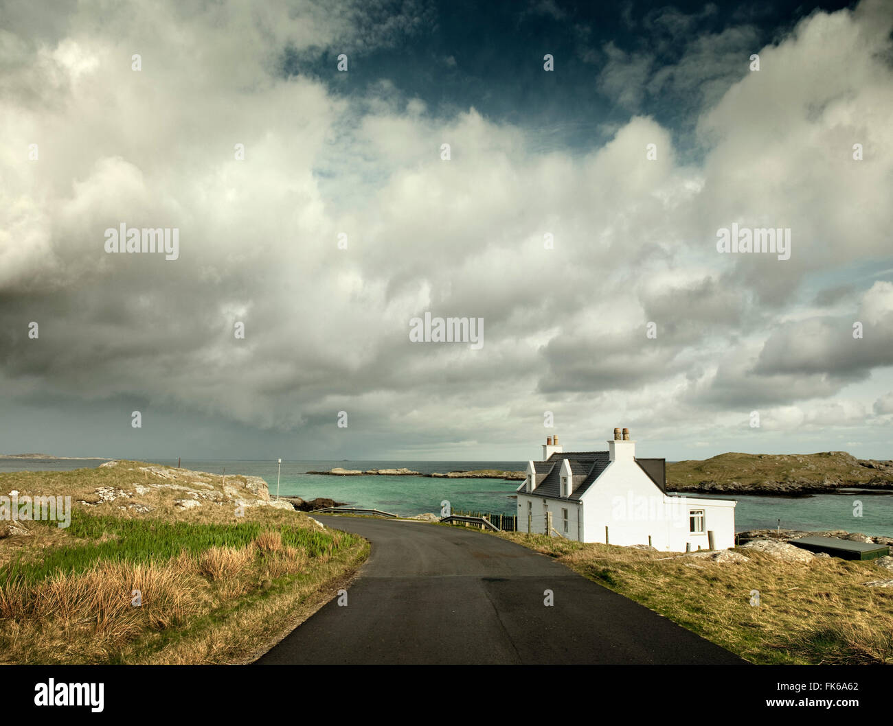 White cottage by the sea, Isle of Barra, Hebrides, Scotland, United Kingdom, Europe Stock Photo