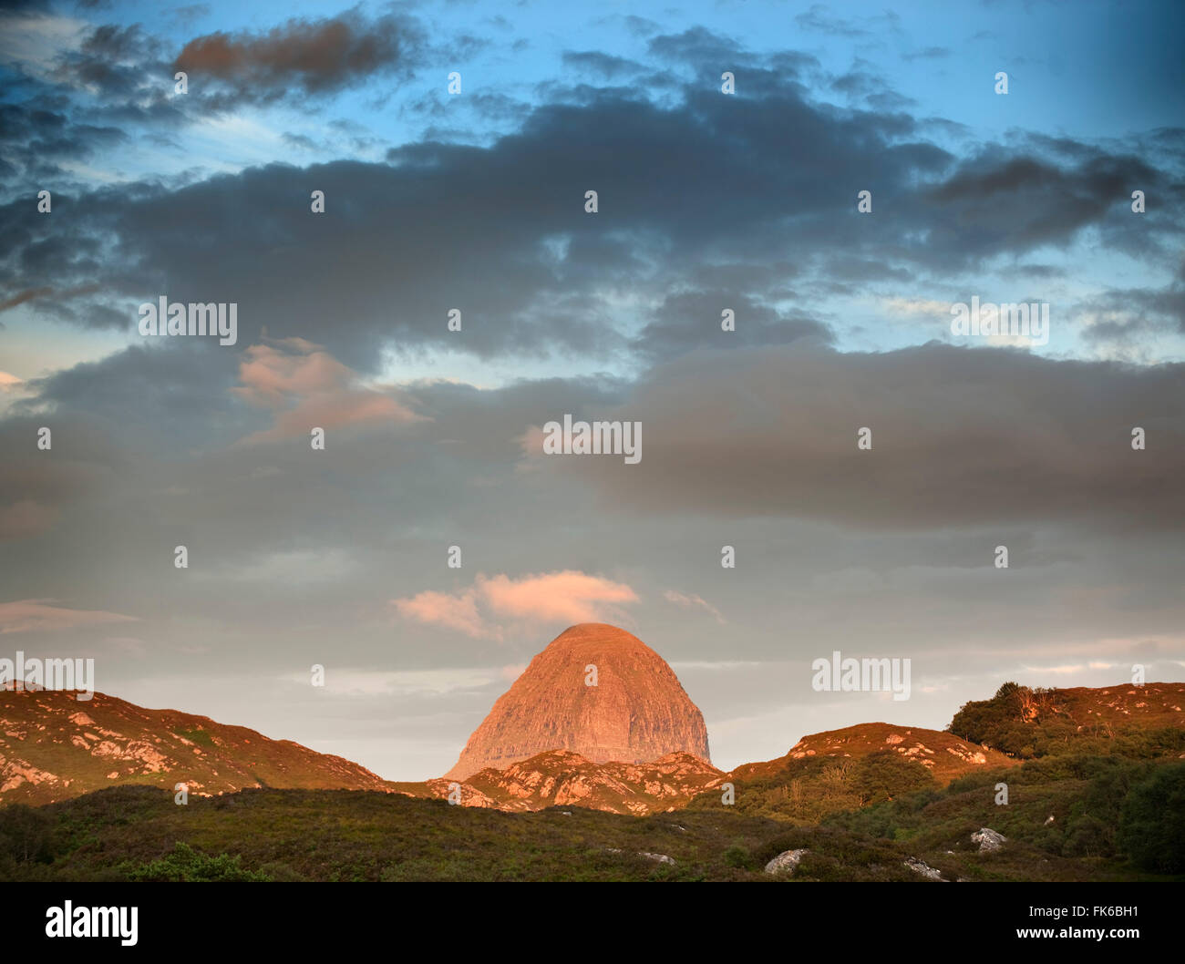 The distinct shape of Suilvan mountain in Assynt, Sutherland in the Highlands of Scotland, United Kingdom, Europe Stock Photo