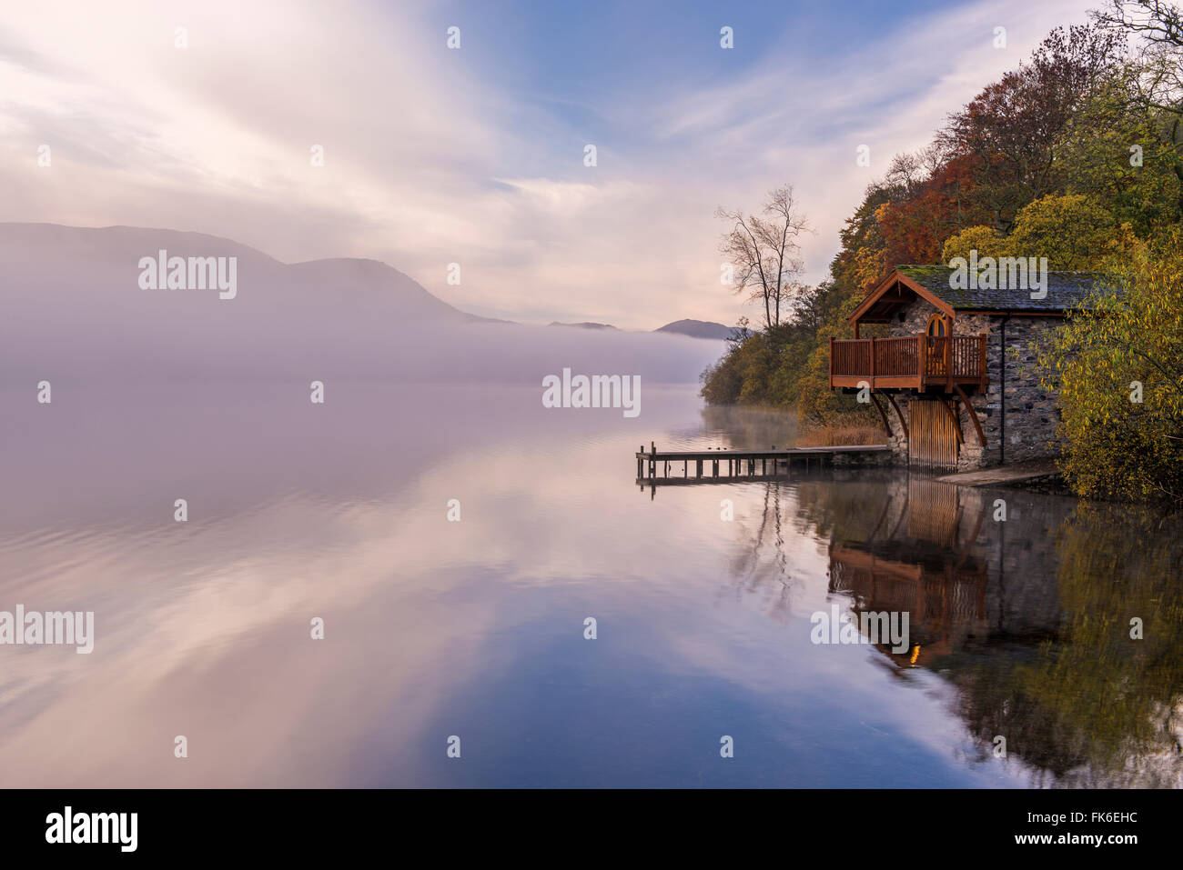 Duke of Portland Boathouse on misty Ullswater in autumn, Lake District