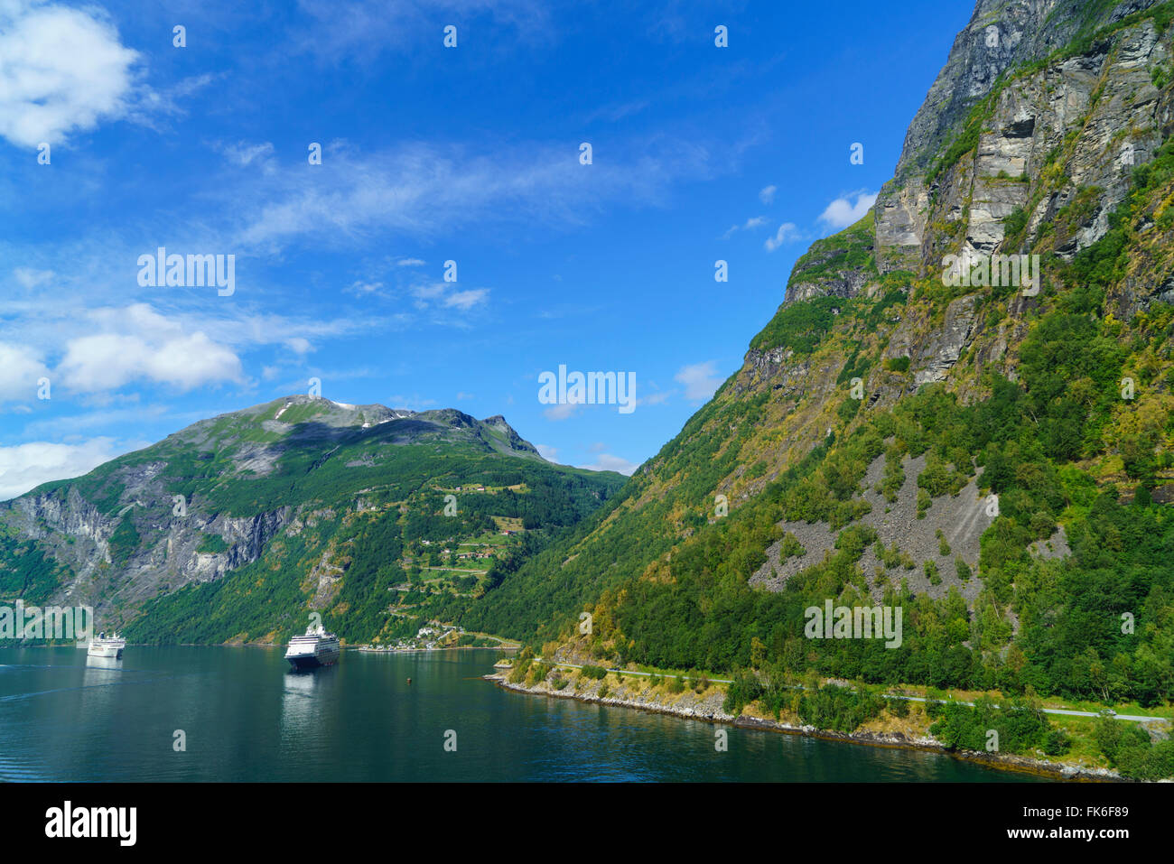 Cruiseships moored at the head of Geirangerfjord by the village of Geiranger, UNESCO World Heritage Site, Norway, Scandinavia Stock Photo
