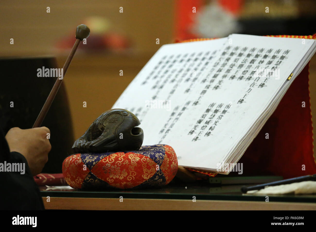 Buddhist sacred texts and a wooden fish (percussion instrument), Fo Guang Shan Temple, Geneva, Switzerland, Europe Stock Photo