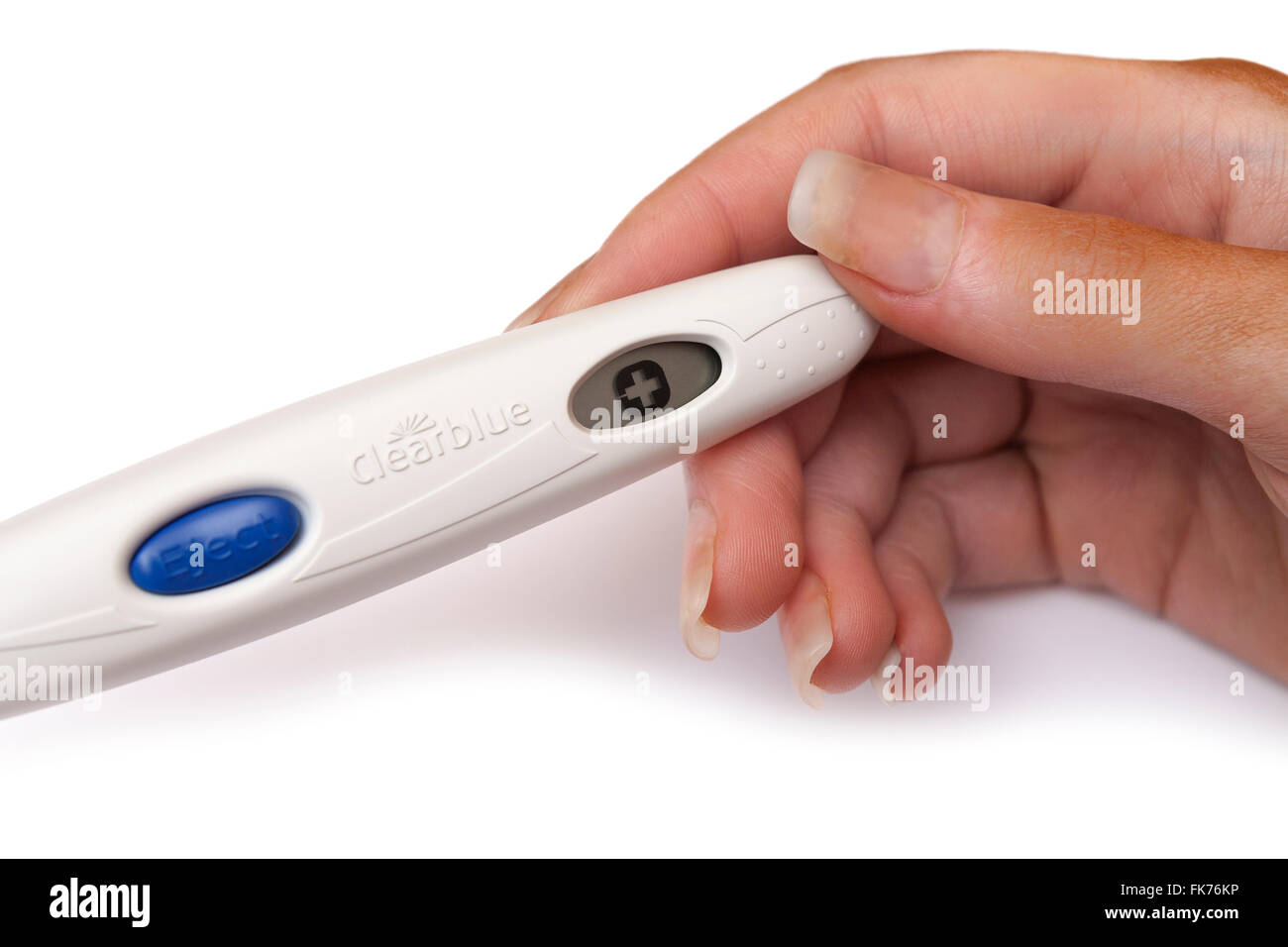 MÖLNDAL, SWEDEN - FEBRUARY 28 2007: Woman holding a positive Clearblue home  pregnancy test in her hands isolated on white background Stock Photo - Alamy