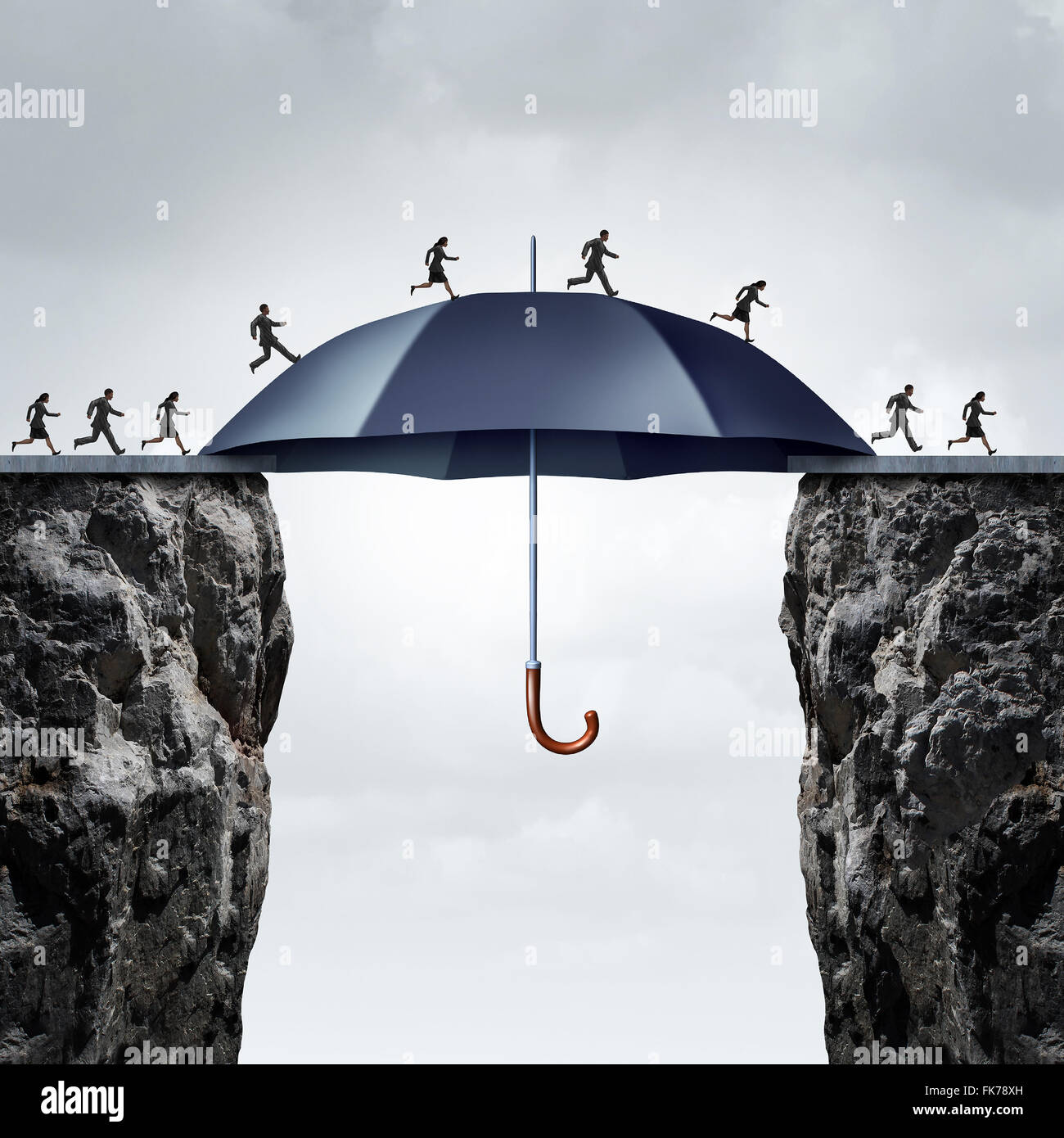 Security bridge concept as business people running across two high cliffs with the help of a safe giant umbrella bridging the gap. Stock Photo