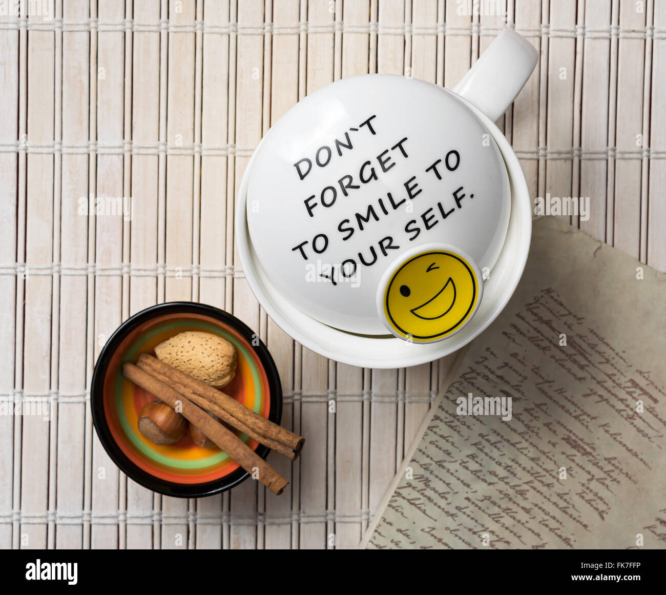 White mug with a positive quote saying Don't forget to smile to ...