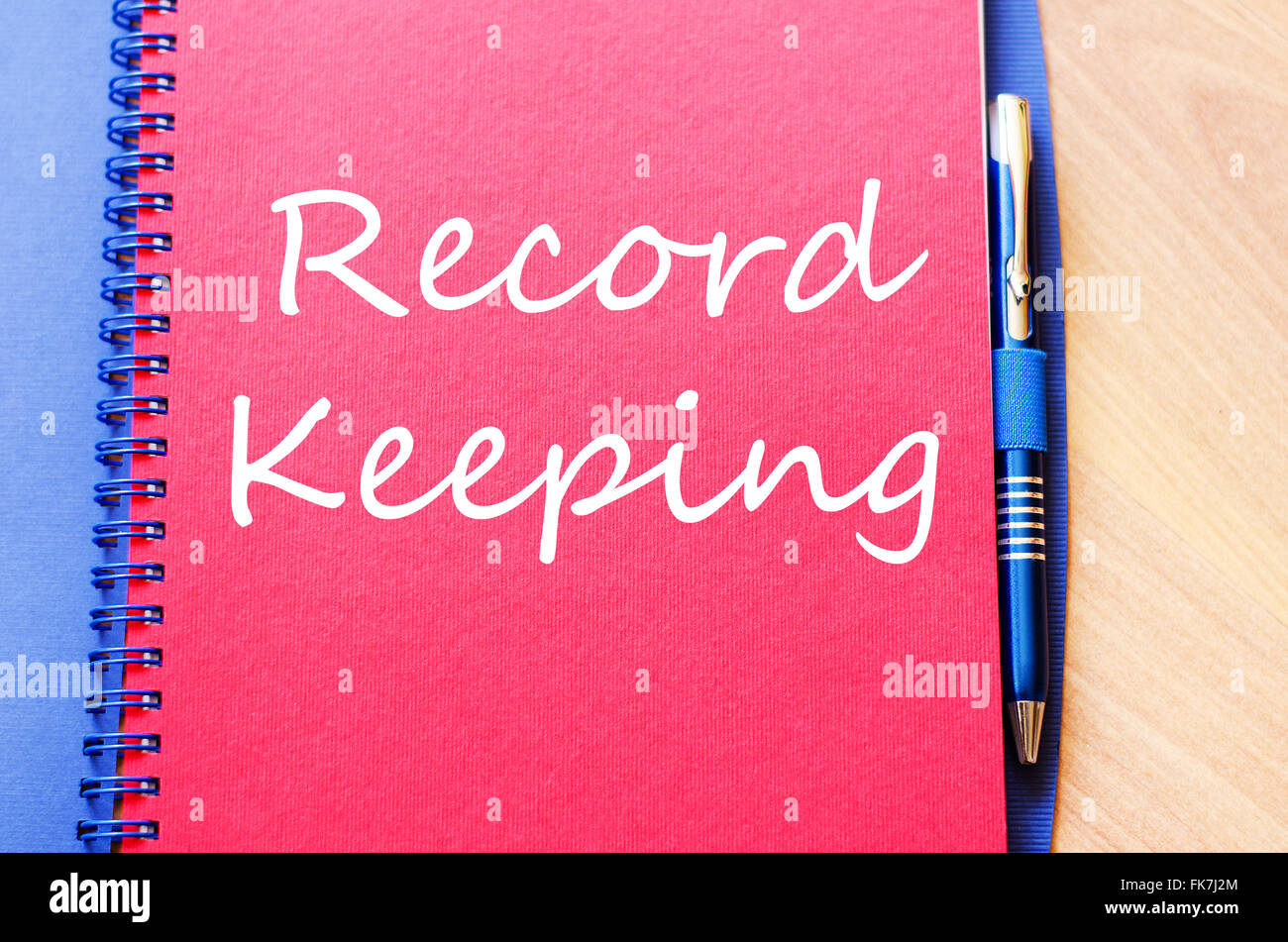 Record keeping text concept write on notebook with pen Stock Photo