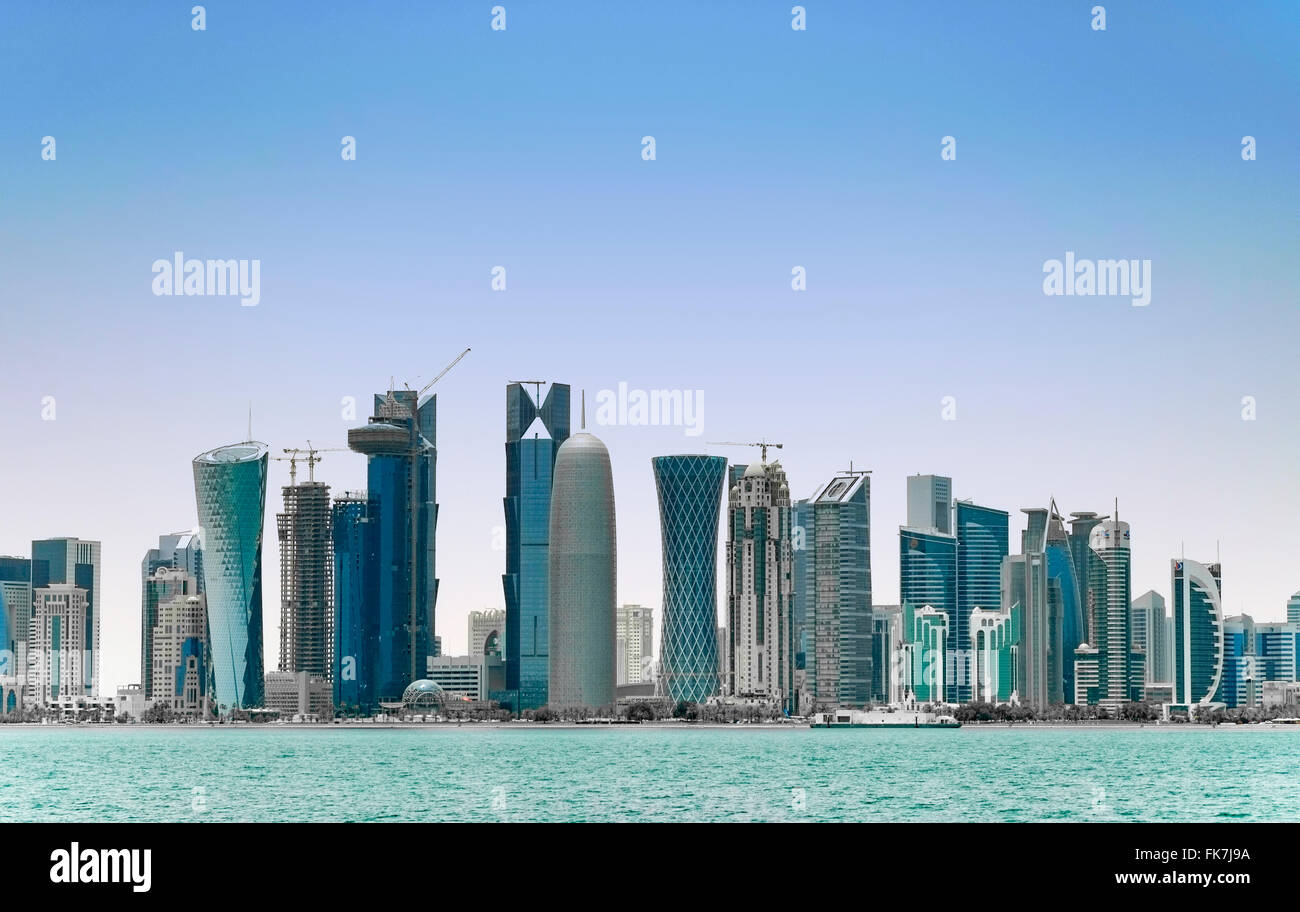 view of many skyscrapers in business district along Corniche in Doha Qatar Stock Photo