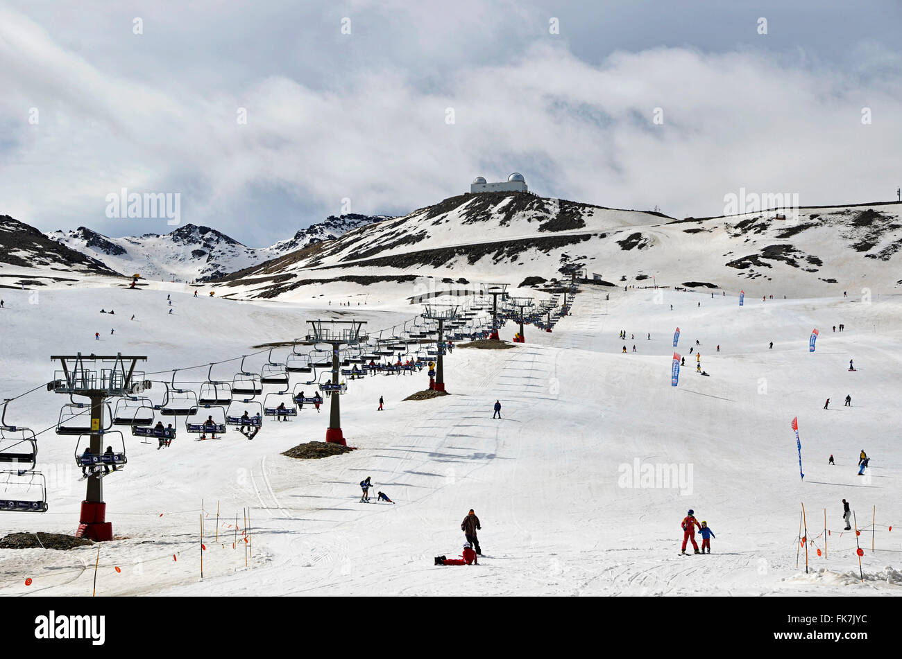 SIERRA NEVADA, SPAIN - APRIL 24, 2015: The ski resort of Sierra Nevada is the most important in southern Spain for winter sports Stock Photo