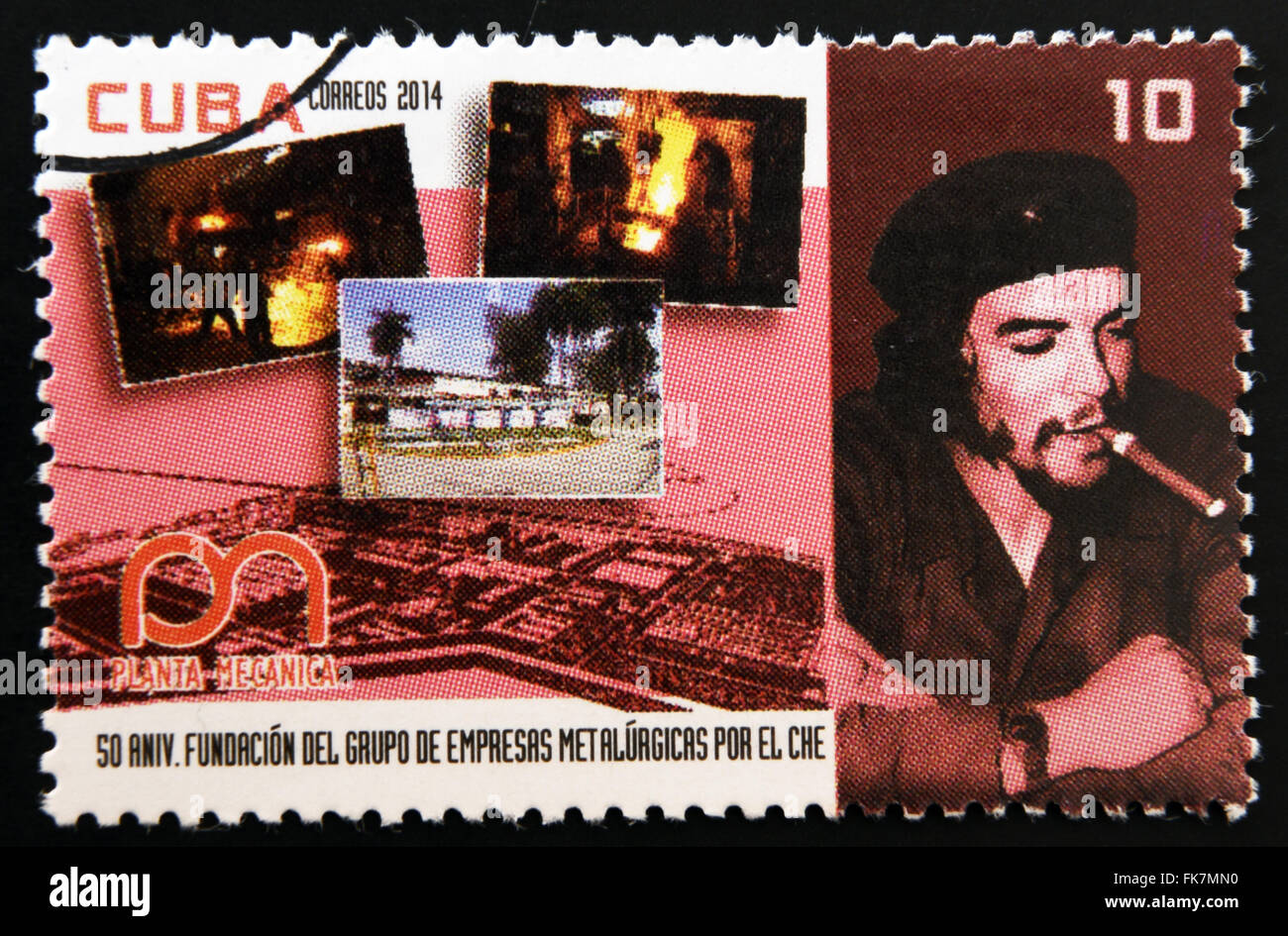 CUBA - CIRCA 2014: A stamp printed in Cuba dedicated to 50th anniversary of the founding of metallurgical enterprises Stock Photo